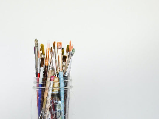 hobby paint brushes in jar